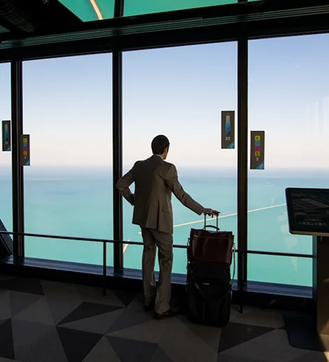 Man at airport window